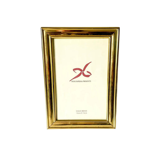 Gold picture frame with a white mat featuring a red logo on a white background